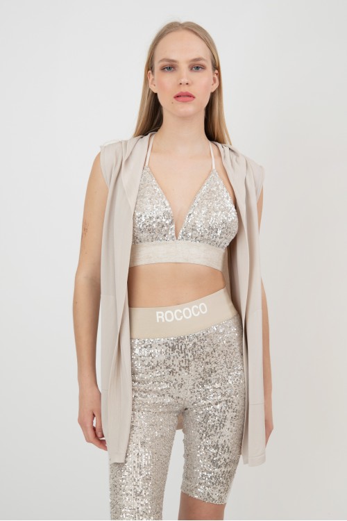 Top with sequins and neck tie