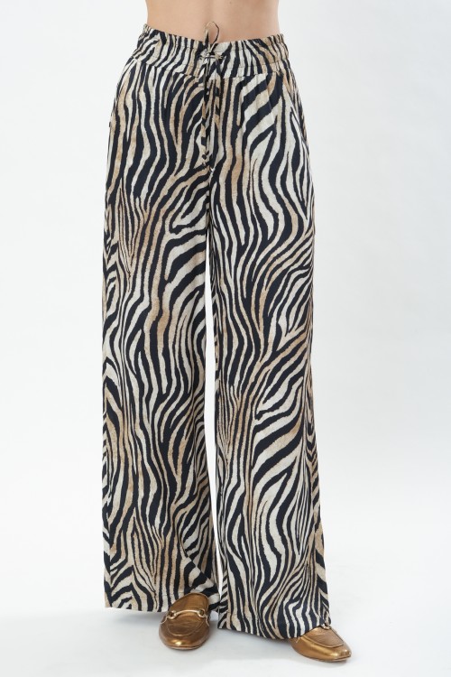 Printed pants with elastic band at the waist, women's